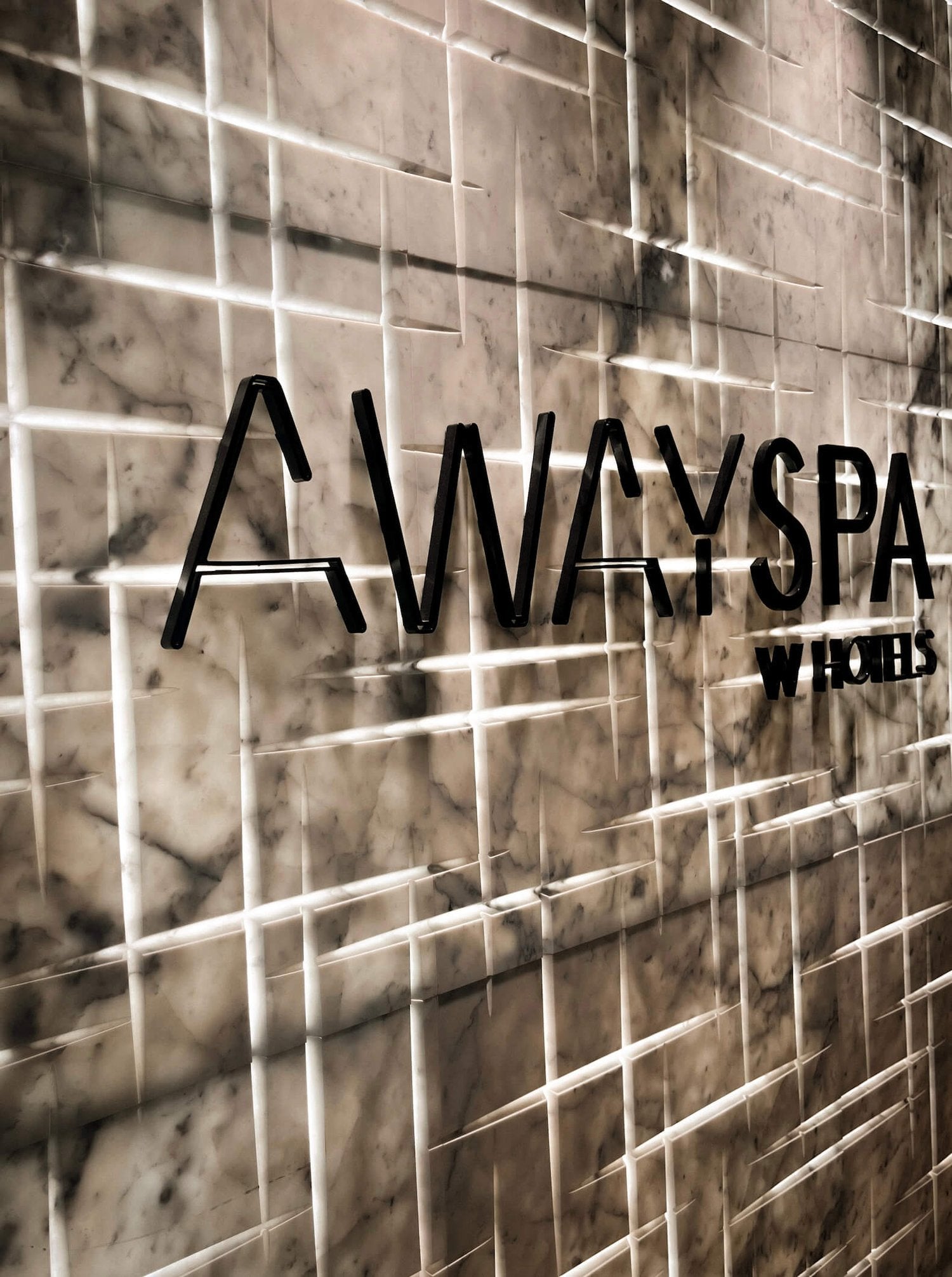 Social media content for W Hotel Dallas showing the Away Spa at the hotel.