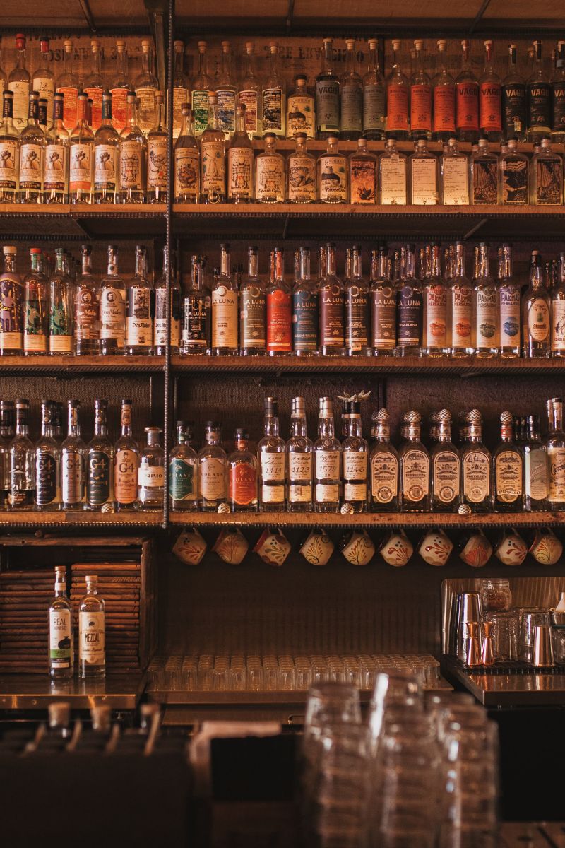 Social Media content for Las Almas Rotas showing extensive Mezcal library.